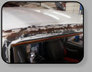 Another example of a windshield installation done with poor workmanship on a Chevy Express Van