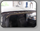 A Chevrolet Tahoe suffering from Poor Workmanship from its prior windshield installation.