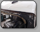 A Chevrolet Tahoe suffering from Poor Workmanship from its prior windshield installation.