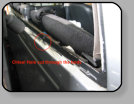 Poor workmanship on a Chevy pickup back glass installation.  The vehicle had to go to an auto body shop to repair the rust and holes that were cut into the pinchweld.
