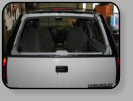 Some hatch type back glass installations such as the GM vehicle pictured here have an inner skeleton that fills with broken tempered glass fragments